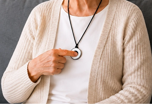 Pressing the SOS button on the pendant